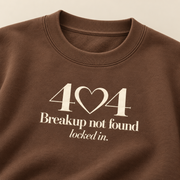 Lumiera 404 Breakup Not Found chestnut crewneck print close-up