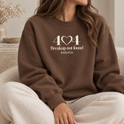 Lumiera 404 Breakup Not Found chestnut crewneck seated model