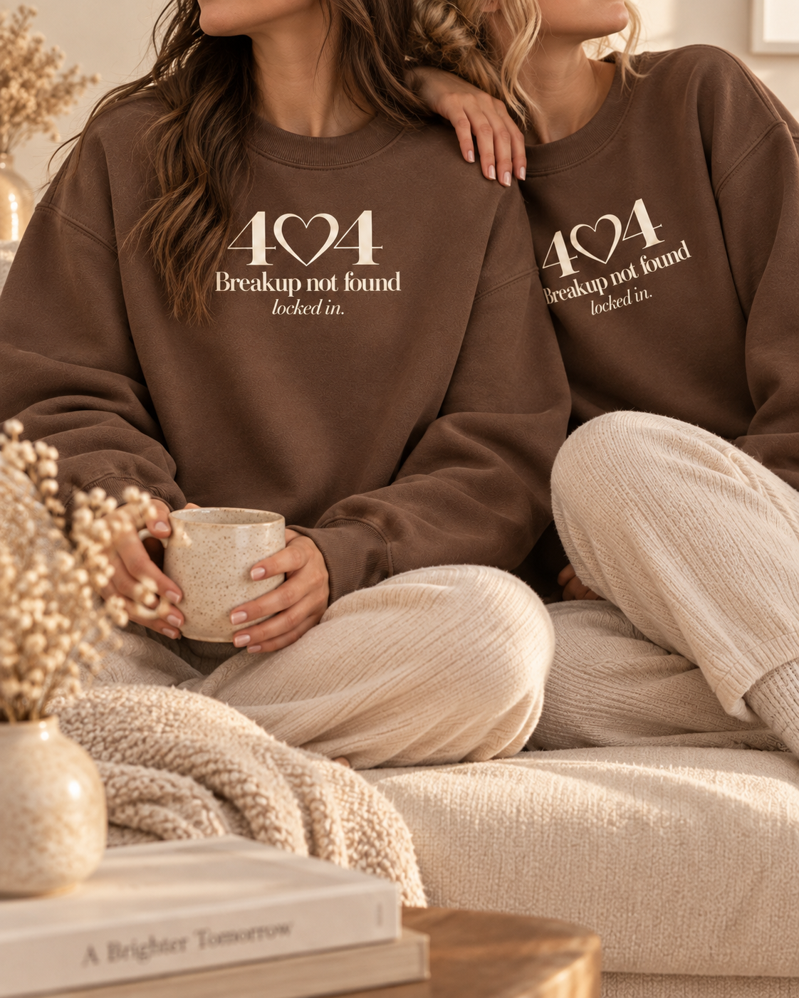 Faceless models wearing matching chestnut 404 Breakup Not Found crewnecks