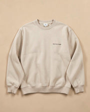 Beige Never Lose the Light sweatshirt flat lay